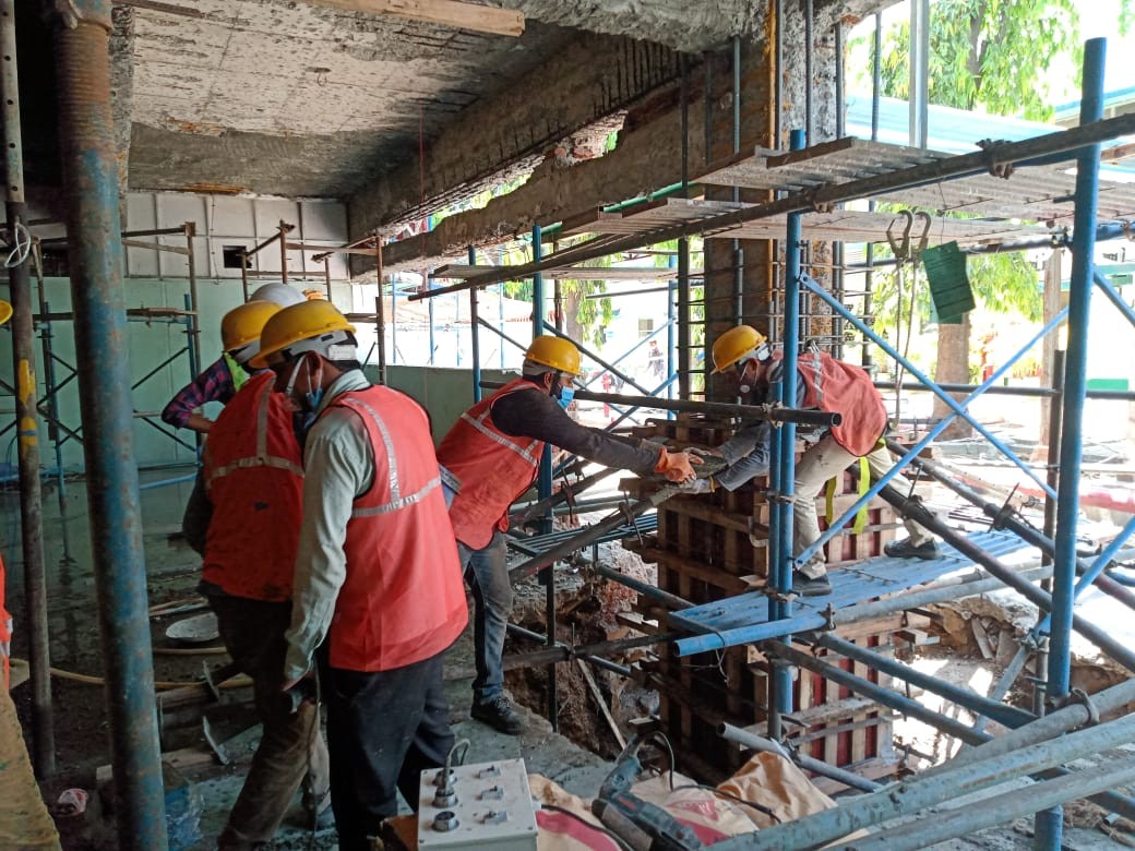 Building renovation and rehabilitation services improving structure strength and durability